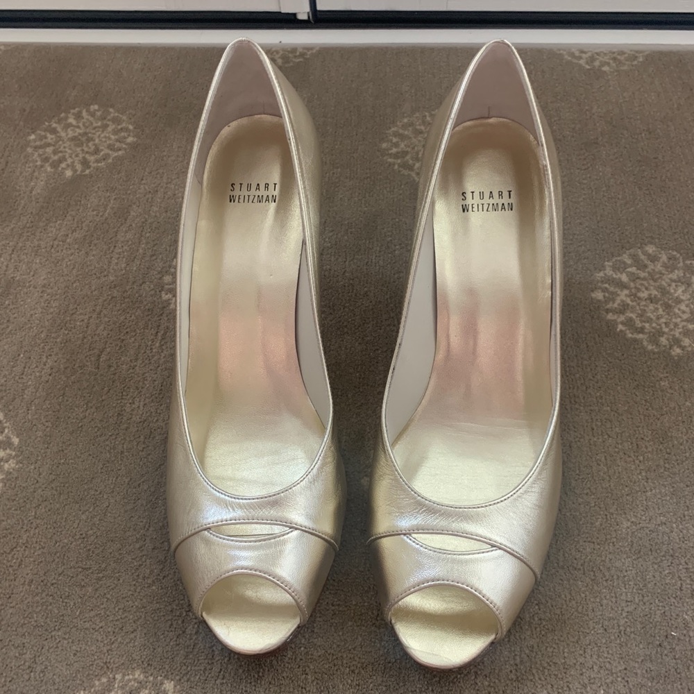 Never worn Stuart Weitzman peep toe pumps